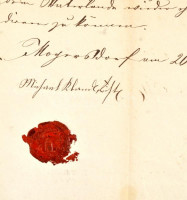 1861 Nagyfalva (ma: Mogersdorf, Burgenland, AU) a falusi bíró német nyelvű igazolása nagyfalvi lakos korábbi (1848-as) katonai szolgálatáról, a község rányomott viaszpecsétjével, külzetén a szentgotthárdi főbíró magyar nyelvű
